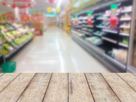 Wood floor and Supermarket blur background photo