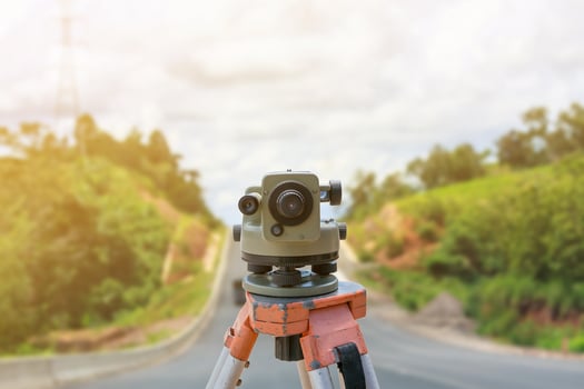 road construction site, theodolite instrument for road construction photo