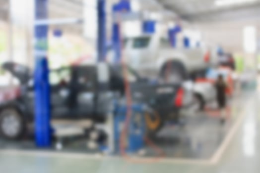 car repair service center blurred background photo