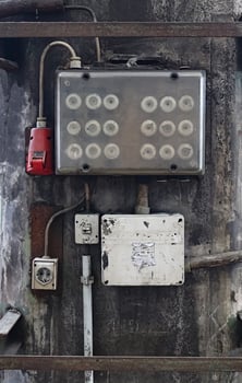 Very old electric installtion with cables and fuses. photo