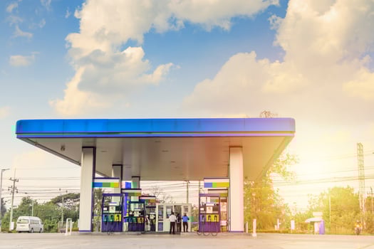 Petrol gas fuel station with clouds and blue sky photo