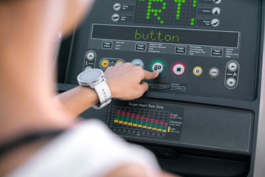 young happy asian woman athlete run on treadmill, running machine, in indoor gym fitness for health photo