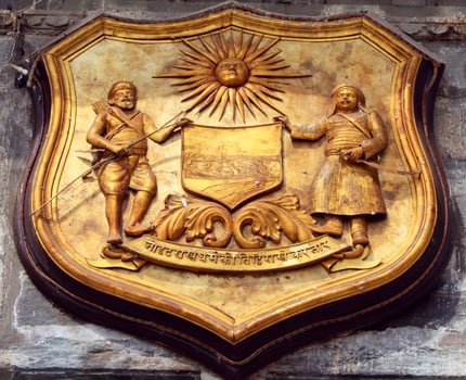 A coat of arms on a building photo