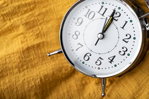 the clock place on the yellow fabric photo