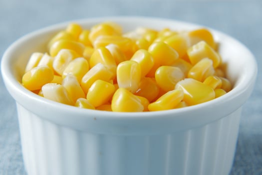 Sweet corns in a bowl on table , photo