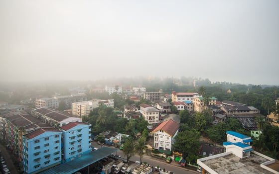 Scenery view of fog covered Yangon township the commercial capital of Myanmar in the morning. photo