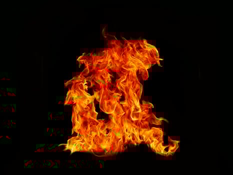 Flame meat that burns from a furnace or from cooking. dangerous feeling abstract black background .Suitable for banners or advertisements photo