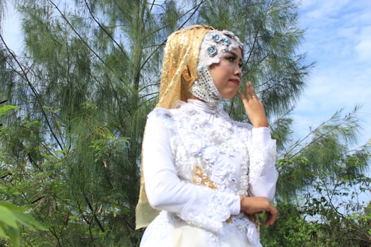 selective focus of women who are wearing wedding dress typical of Java, Indonesia photo