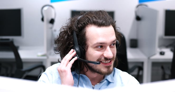 male call centre operator doing his job photo