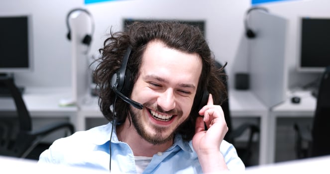 male call centre operator doing his job photo