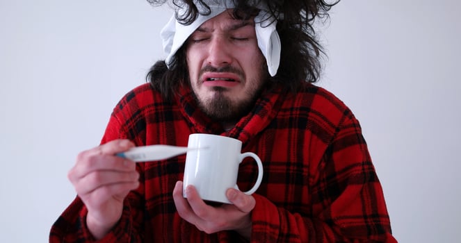 Man with flu and fever photo