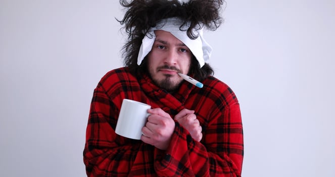 Man with flu and fever photo