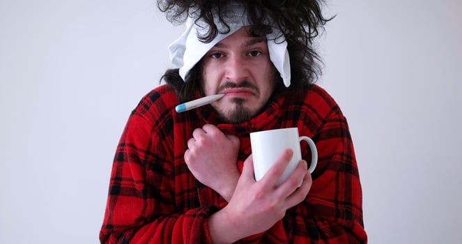 Man with flu and fever photo