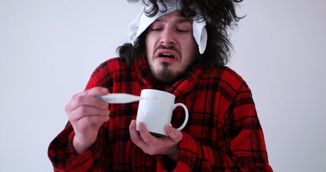 Man with flu and fever photo