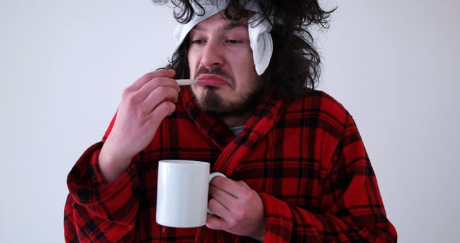 Man with flu and fever photo