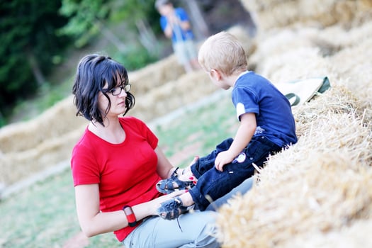 woman and child have fun outdoor photo