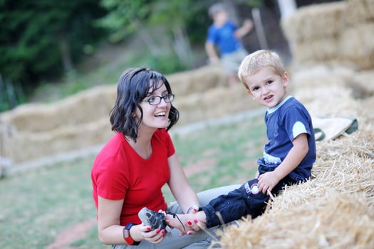 woman and child have fun outdoor photo