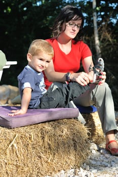 woman and child have fun outdoor photo