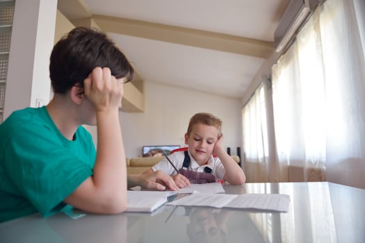 Boy doing homework photo