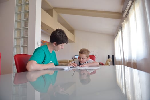 Boy doing homework photo