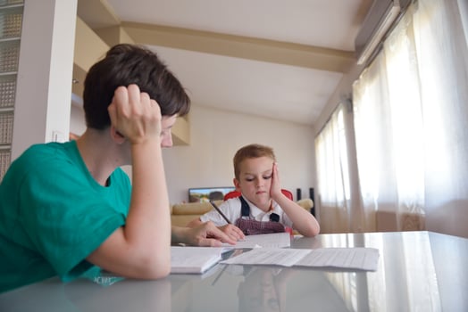 Boy doing homework photo