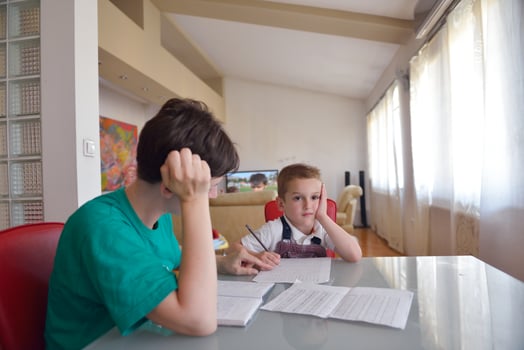 Boy doing homework photo