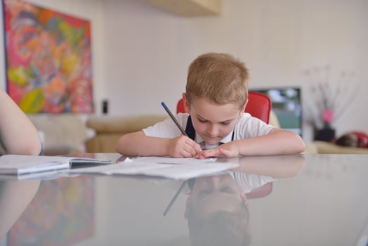 Boy doing homework photo
