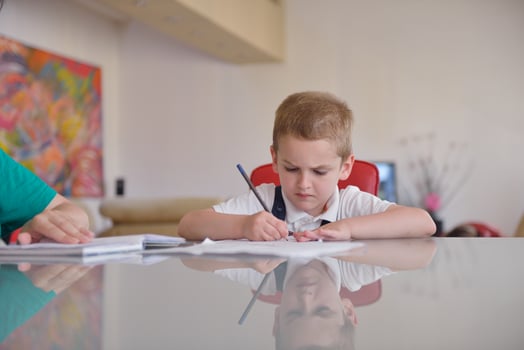 Boy doing homework photo