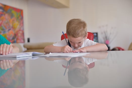 Boy doing homework photo