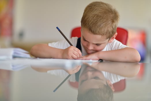 Boy doing homework photo