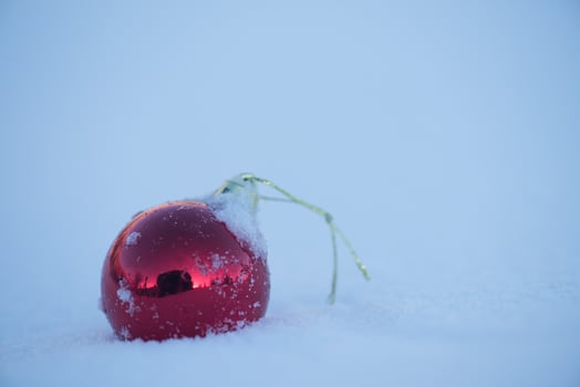christmas ball in snow photo