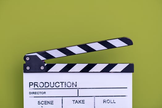 movie clapper on green chroma background photo