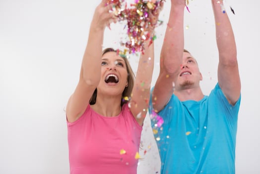 romantic young  couple celebrating  party with confetti photo