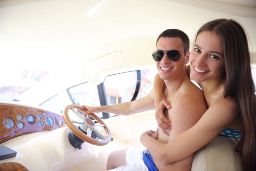 young couple on yacht photo