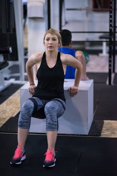 athletes working out their arms photo