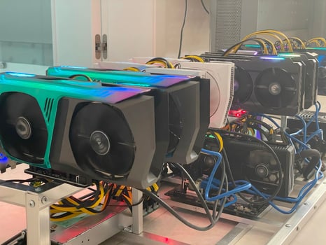 Row of bitcoin miners set up on the wired shelfs. Device for mining crypto currency. Mining cryptocurrency. Bitcoin farm. Machines for mining cryptocurrency bitcoin. Electronic device at day. photo