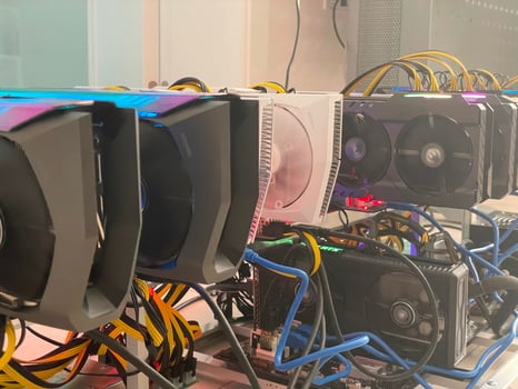 Row of bitcoin miners set up on the wired shelfs. Device for mining crypto currency. Mining cryptocurrency. Bitcoin farm. Machines for mining cryptocurrency bitcoin. Electronic device at day. photo
