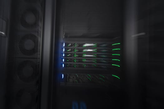 server room or data center supercomputer technology equipment, abstract close up of a server rack with motion blur. photo