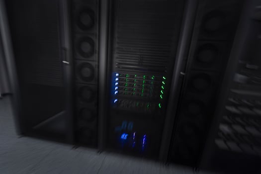 server room or data center supercomputer technology equipment, abstract close up of a server rack with motion blur. photo