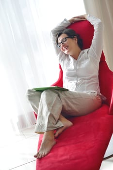woman using tablet pc at home photo