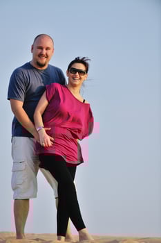 couple enjoying the sunset photo
