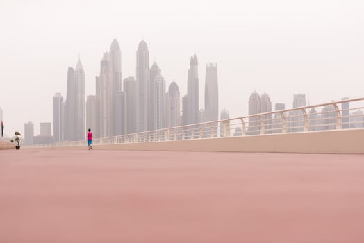 woman running on the promenade photo