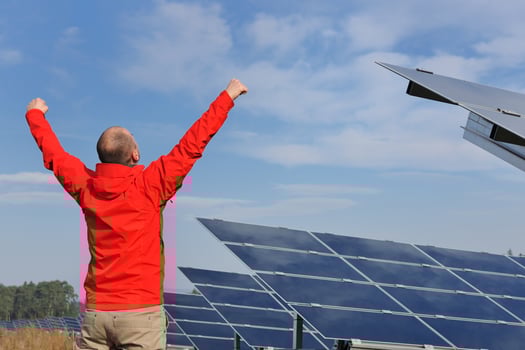 Male solar panel engineer at work place photo