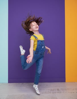 Cute little girl dancing at home photo
