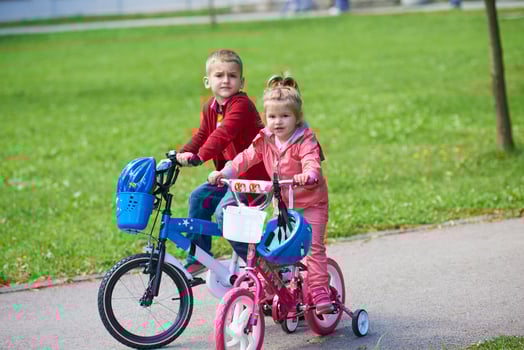 boy and girl with bicycle photo