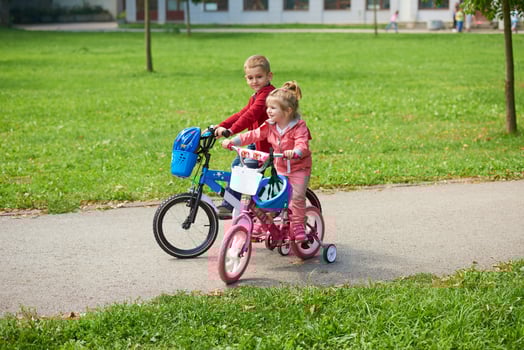 boy and girl with bicycle photo