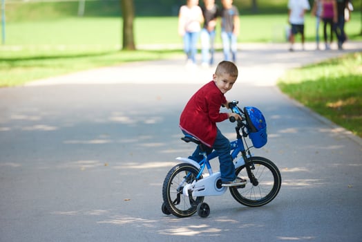 boy on the bicycle at Park photo