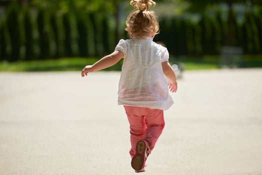 little girl have fun in park photo
