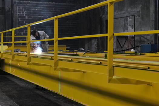 Welder in factory photo