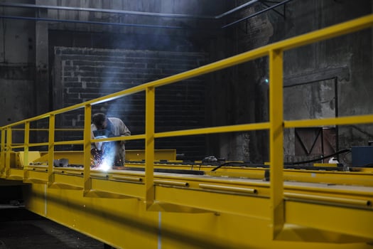welder working indoors photo